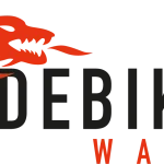Ride Bikes Wales in Pontyclun, featuring a display of high-end Trek road and electric mountain bikes alongside premium cycling components.