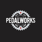 Pedalworks bike shop in Dunstable, showcasing a premium selection of Trek, Cannondale, and Giant road, mountain, and electric bikes alongside cycling gear.
